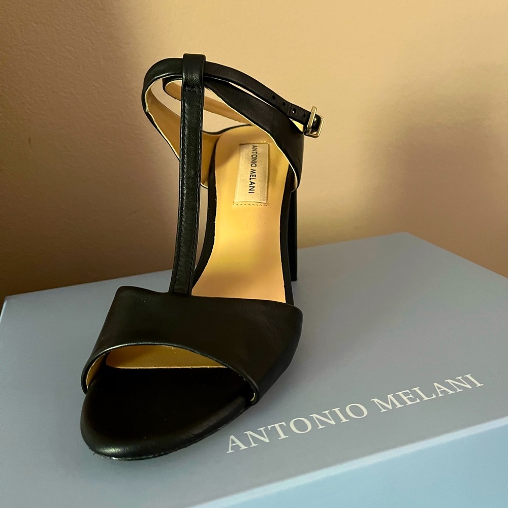 Antonio Melani, used one.